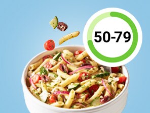 Pasta salad with tomatoes, cucumbers and onions, with a score between 50-79