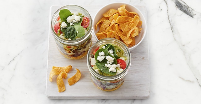 https://www.food4less.com/content/v2/binary/image/blog/food/what-to-eat-for-lunch/imageset_mason-jar-layered-taco-salad_06-08--5188814_2023_dx_content_p5w4_whattoeatforlunch_mason-jar-layered-taco-salad_inlinehro_640x332-copy.jpg