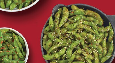 seasoned edamame in a cast iron
