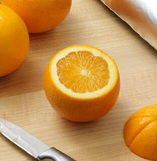 Slice the tops off the oranges