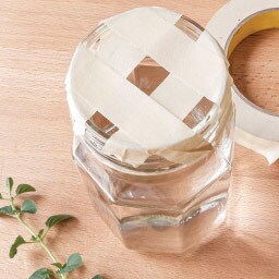 use strips of masking tape to make a square grid across the opening use strips of masking tape to make a square grid across the opening