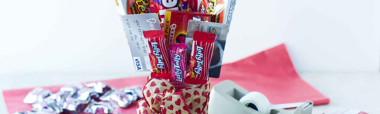 Vase with gift cards and candy as a bouquet Vase with gift cards and candy as a bouquet