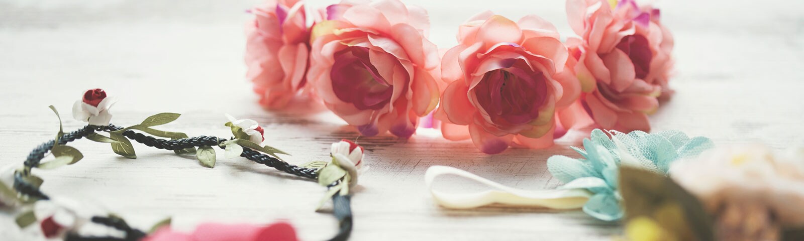 pink and blue flowers used as a crown